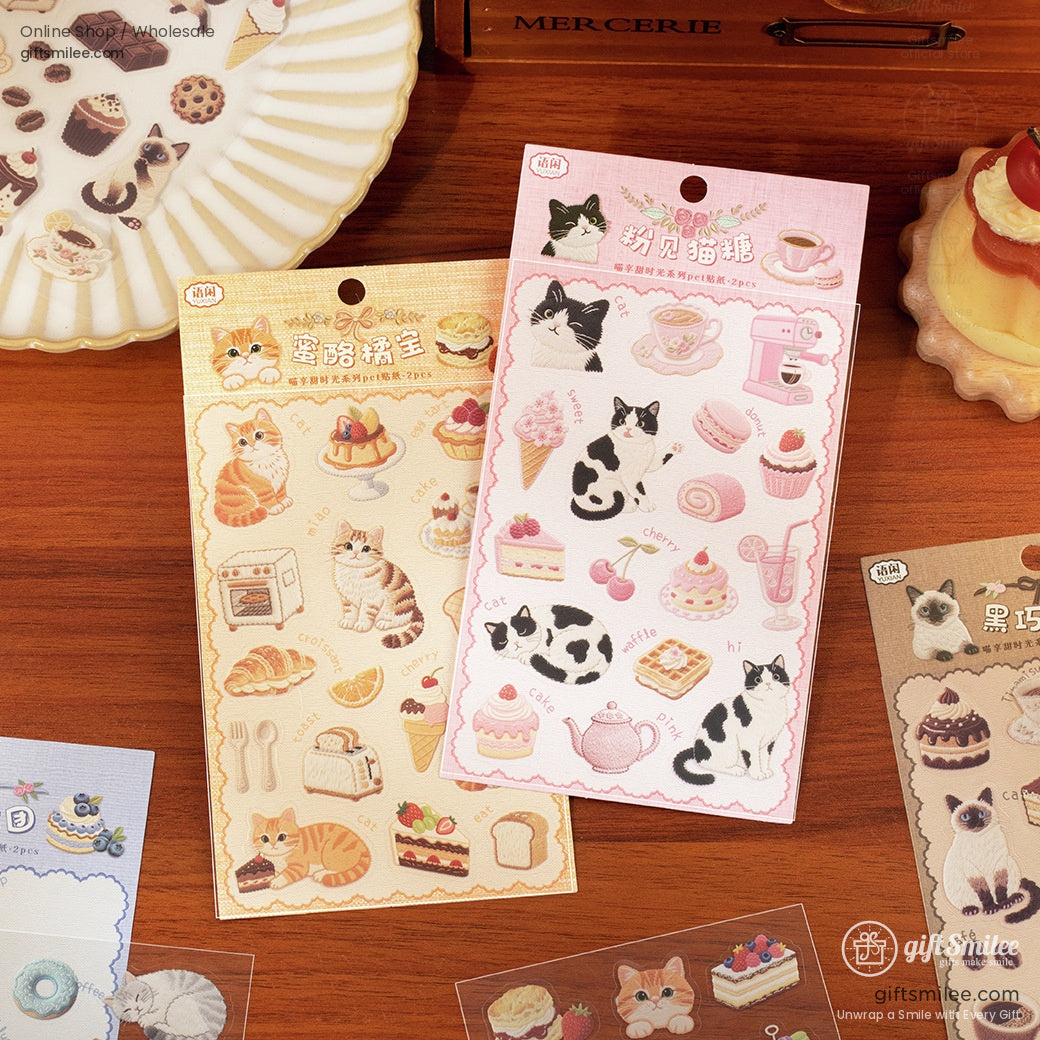 Pastel catthemed sticker sheets with desserts coffee and pastries on wooden table featuring playful and cozy designs