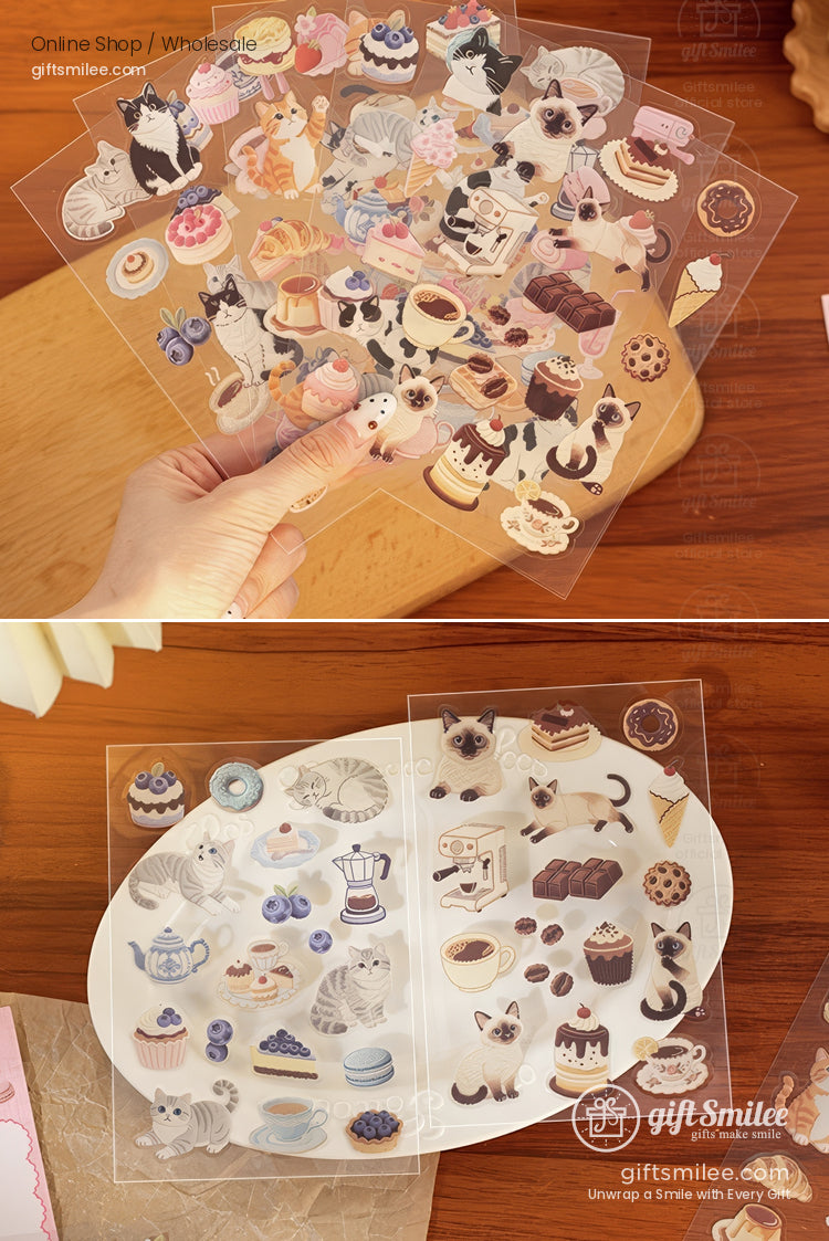 Transparent sticker sheets with cats desserts coffee and pastries featuring pastel and neutral tones on a wooden surface