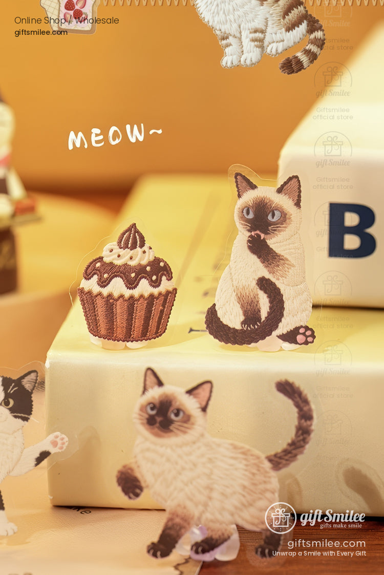 Whimsical catthemed stickers with Siamese cats chocolate cupcake design and playful meow text on a warm beige backdrop