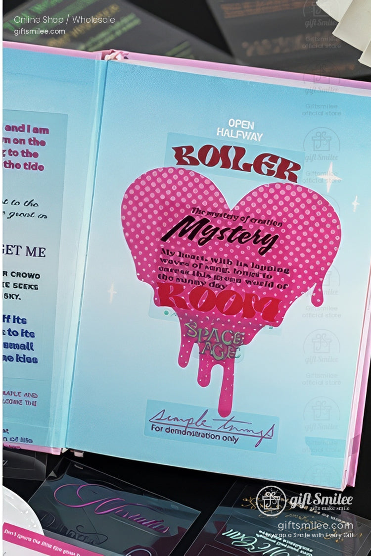 Light blue book spread with pink polkadot melting heart illustration labeled Mystery and bold artistic typography