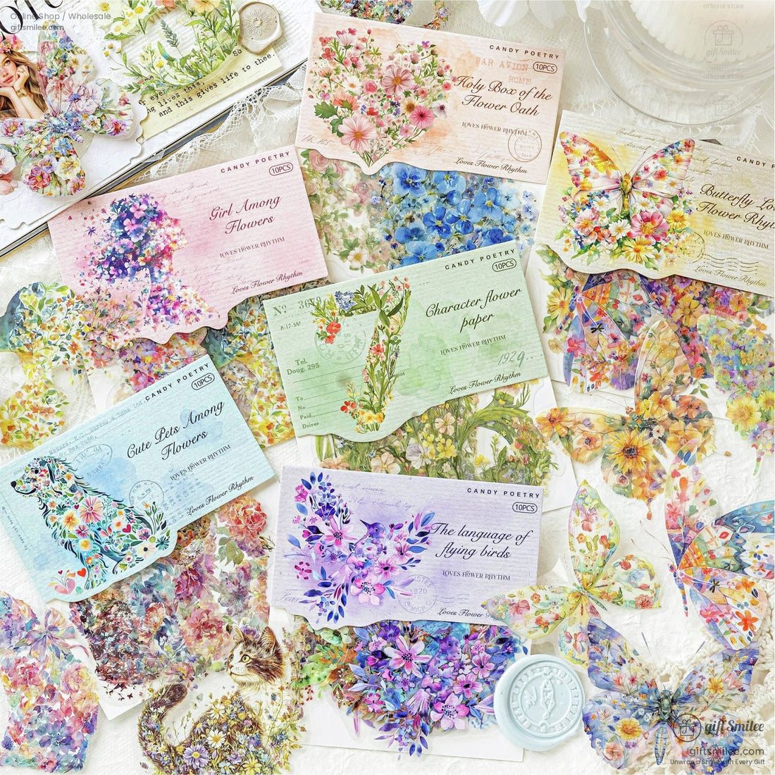 Floral animal stickers featuring vibrant cats and dogs adorned with colorful flowers set on lace with pink roses