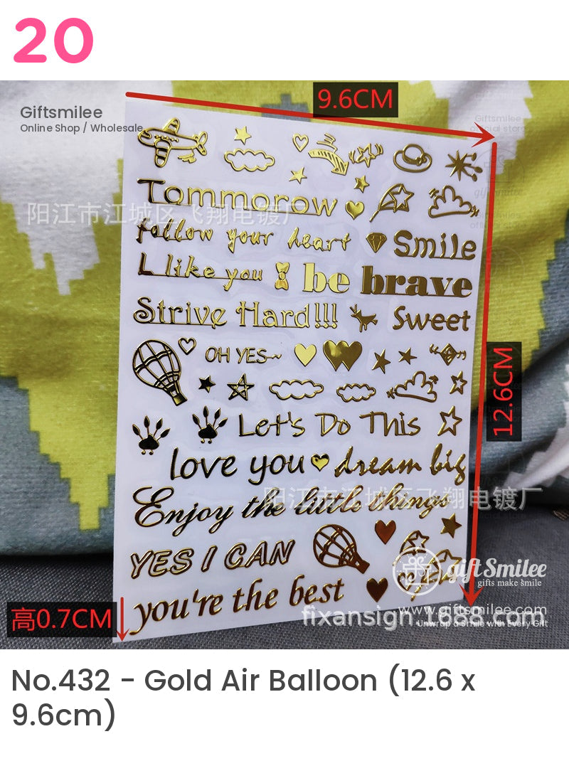 Gold metallic motivational stickers featuring hearts stars hot air balloons and inspirational phrases on a white sheet