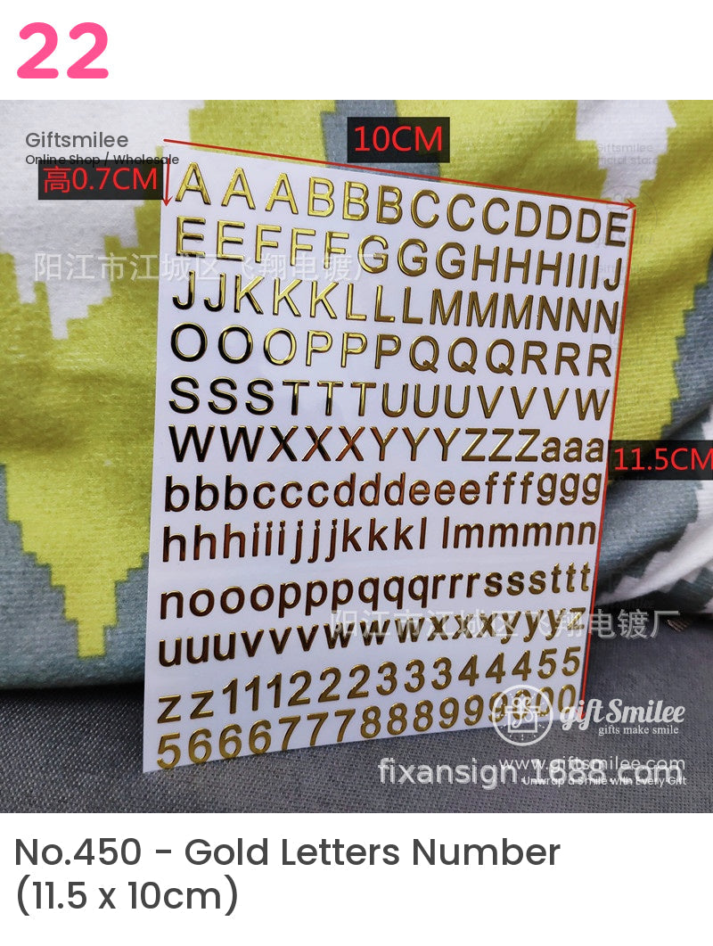 Gold adhesive uppercase and lowercase letter stickers with numeric characters on a white 10x115cm sheet