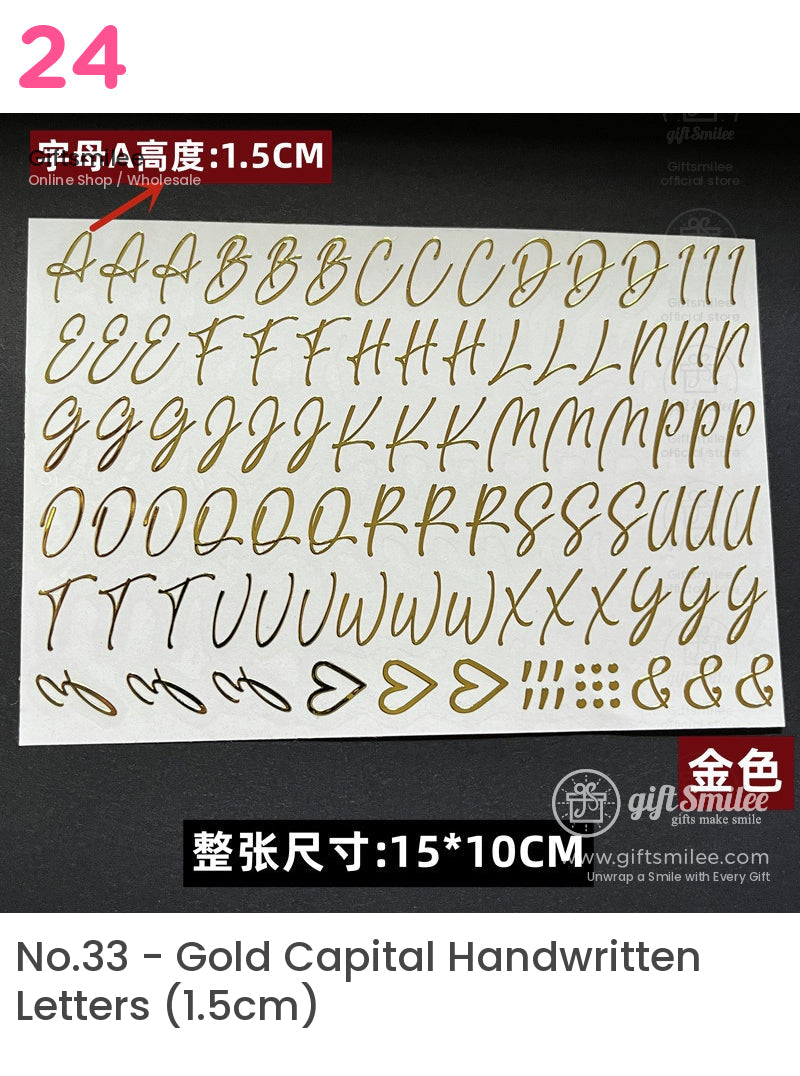 Gold metallic script alphabet stickers with a glossy finish 15 cm tall letters hearts dots and symbols on white sheet