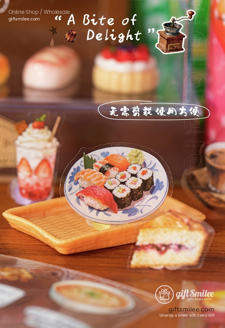 Miniature sushi platter with salmon nigiri maki rolls and garnish on a floral ceramic plate surrounded by desserts