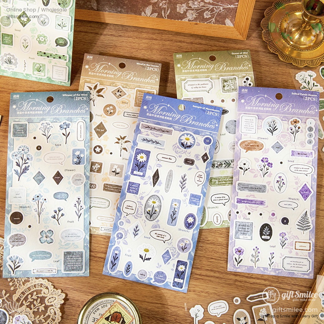 Transparent sticker sheets with blue floral and daisy designs speech bubble tags and soft botanical patterns