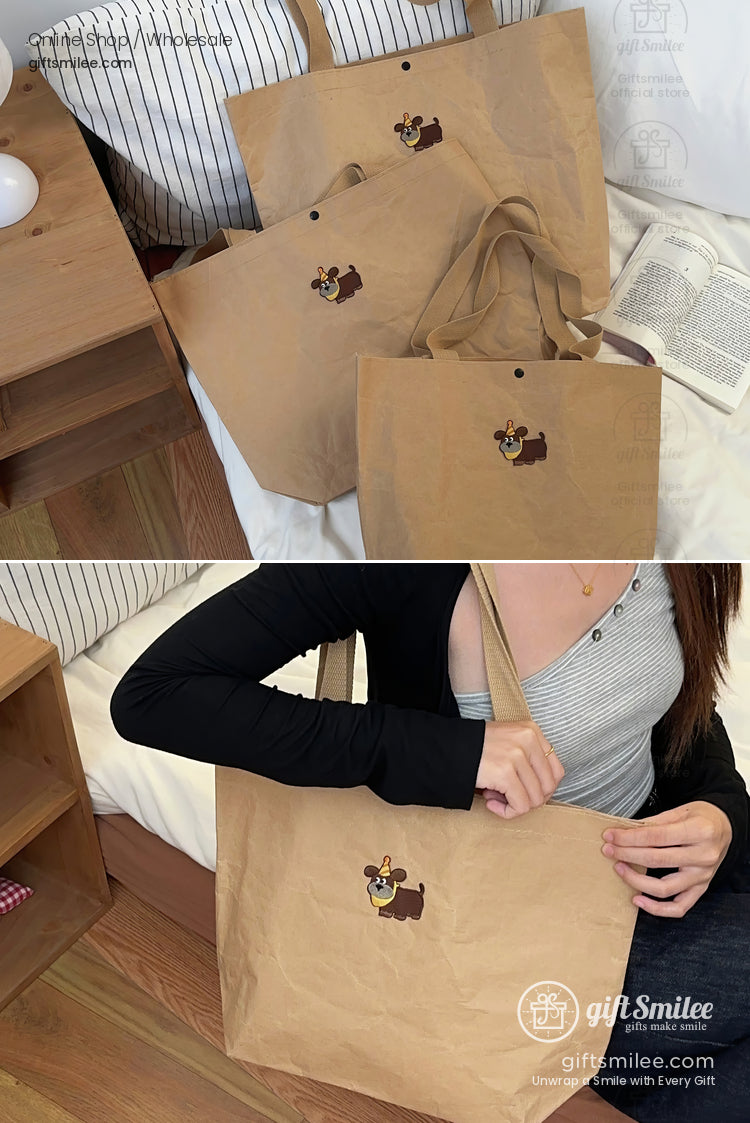 Light brown reusable tote bags with playful dog embroidery lightweight paperlike texture and sturdy fabric handles