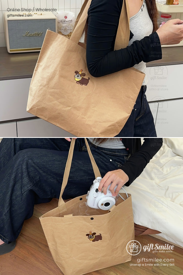 Light brown kraft paper tote bag with a cute embroidered dog design roomy interior and sturdy double handles
