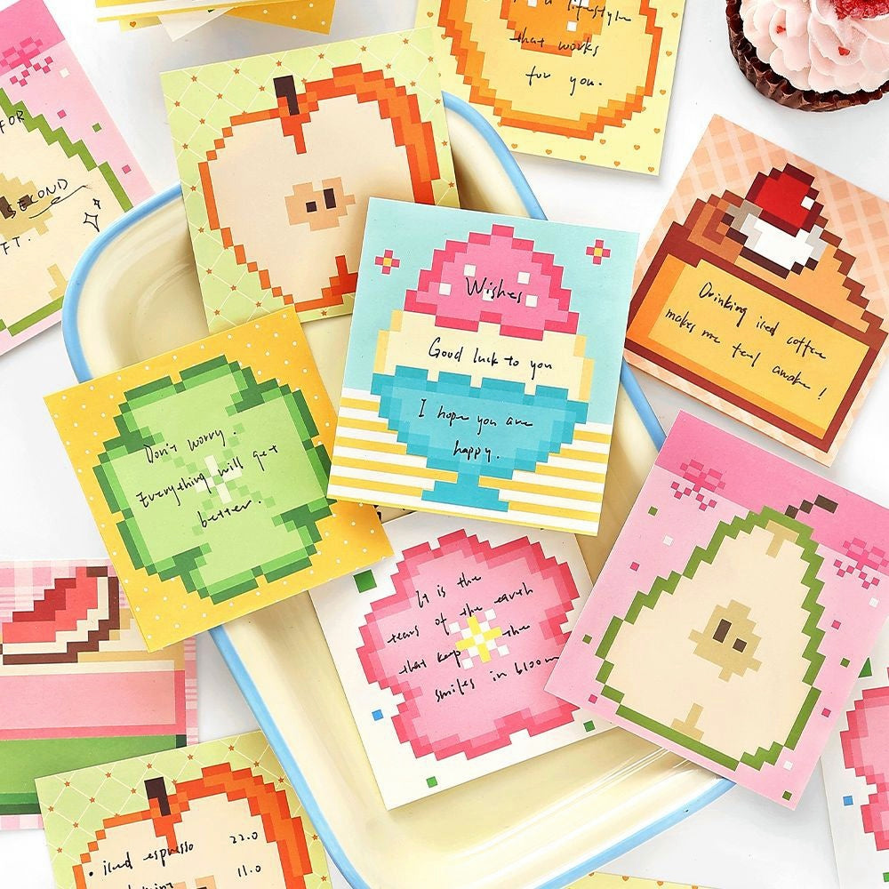 Colorful pixel art greeting cards with fruit and dessert designs pastel backgrounds and handwritten messages