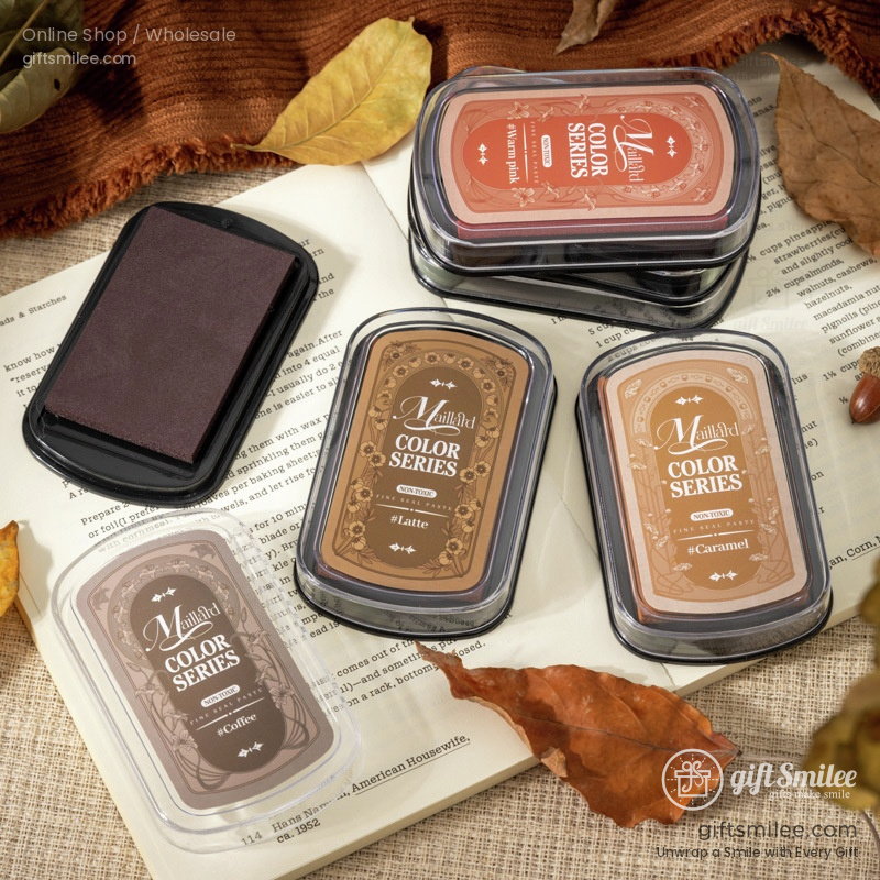 Six rectangular ink pads in black cases with autumn hues deep purple golden yellow burgundy olive green bronze and redorange