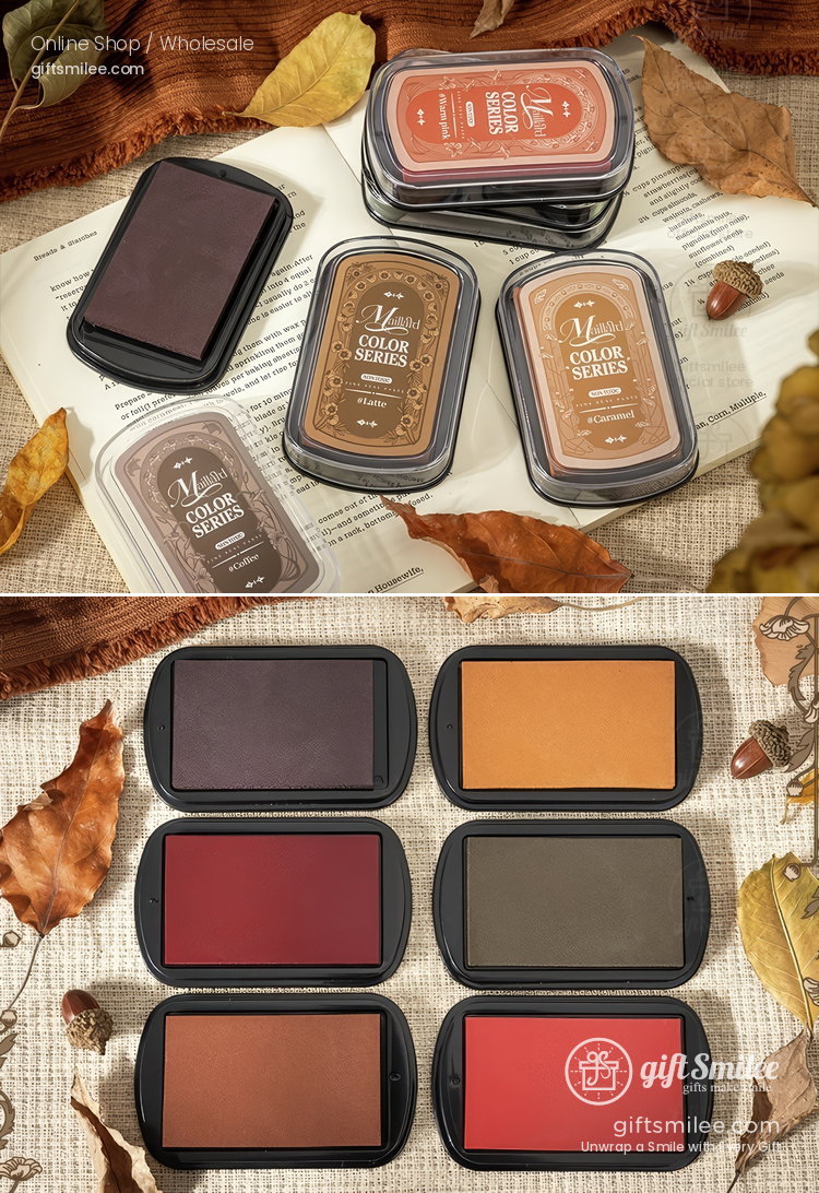 Set of autumnthemed ink pads in rich brown orange and red shades with plastic cases styled with fall leaves