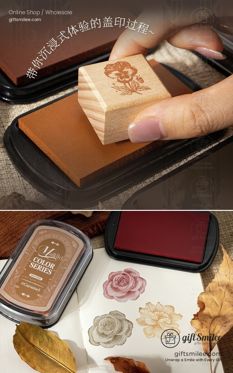 Wooden floral stamp with intricate design brown ink pad and vintagestyle color palette beside decorative prints