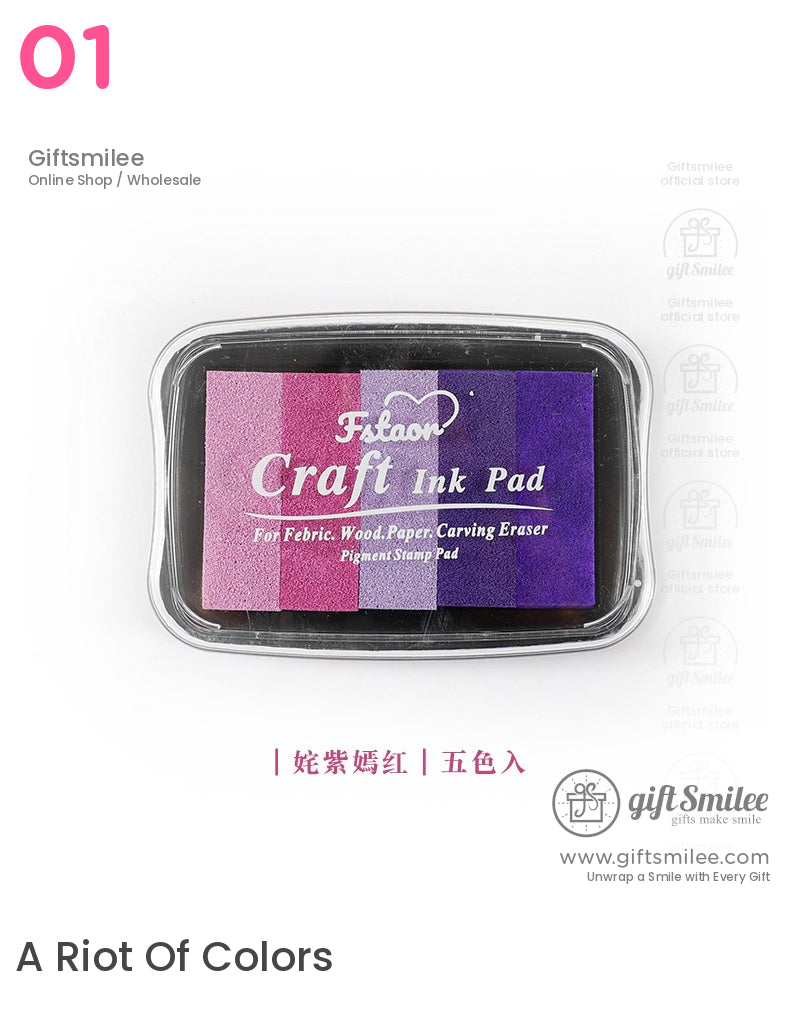 Rectangular craft ink pad with five gradient shades of pink to purple encased in a clear plastic lid