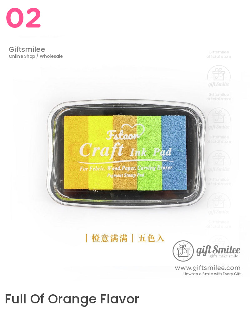 Multicolor craft ink pad with yellow green blue and brown pigment shades in a compact clear plastic case