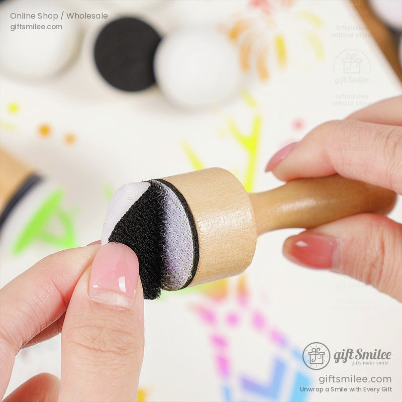 Woodenhandled foam sponge stamper with black white and gradient ink details for crafting or painting projects