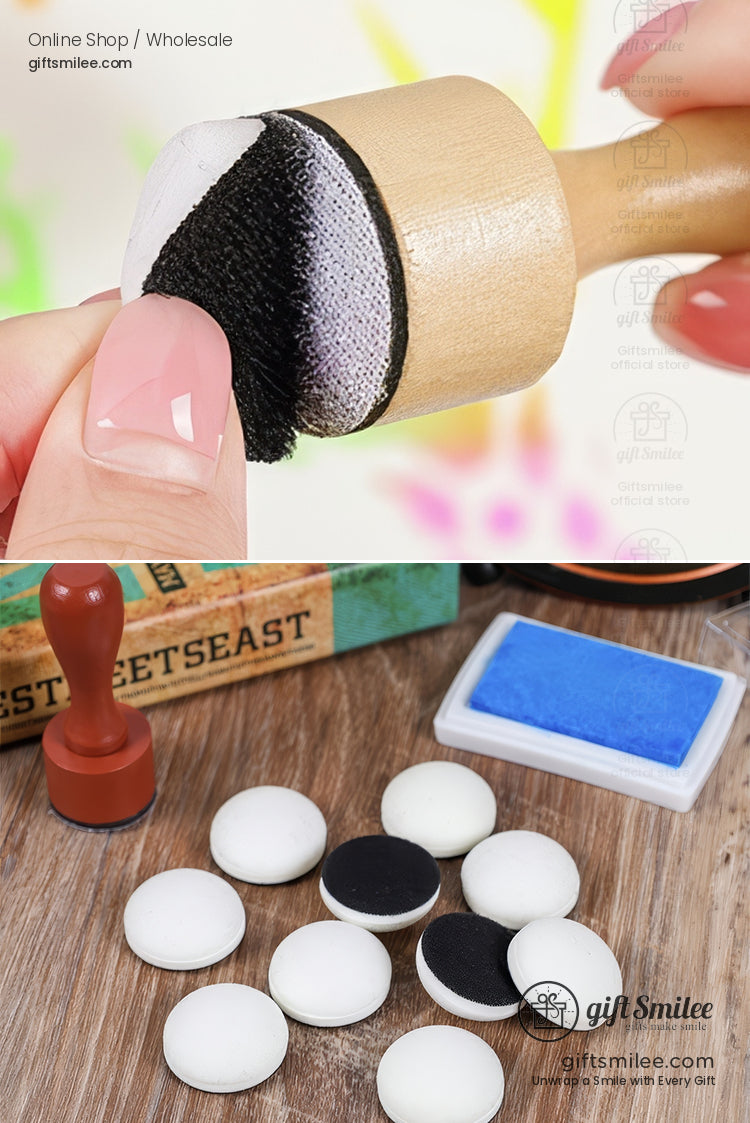 Wooden craft stamp with black foam applicator extra round sponge pads and vibrant blue ink pad on a wooden surface